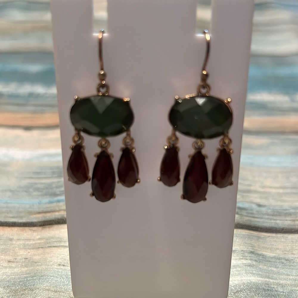 Green and brown stone dangle earrings in gold setting